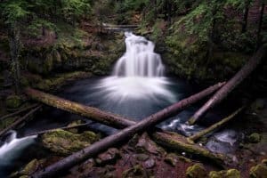 A landscape photograph of Whitehorse Falls in the spring.
