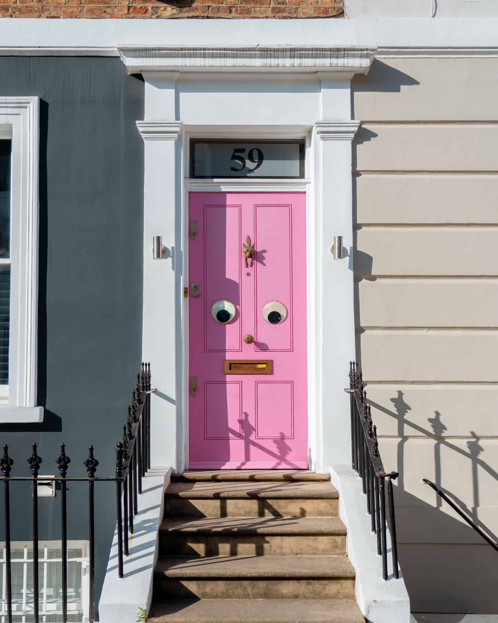 Insta-famous door with fun googly eyes at 59 Portland Road Notting Hill