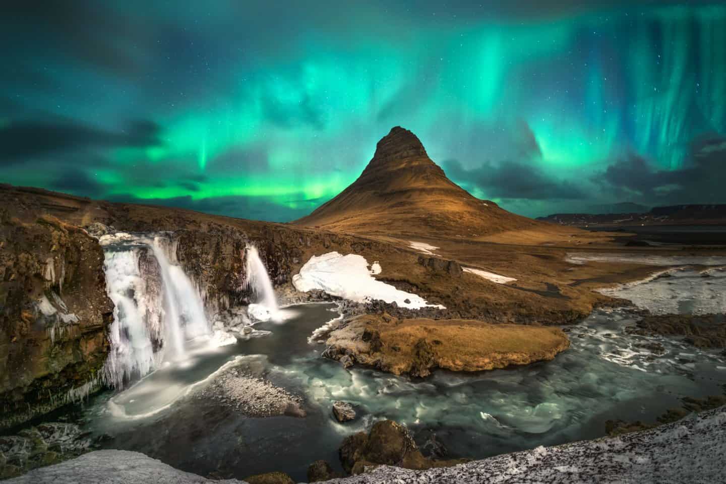 Aurora photography at Kirkjufellsfoss in Iceland.