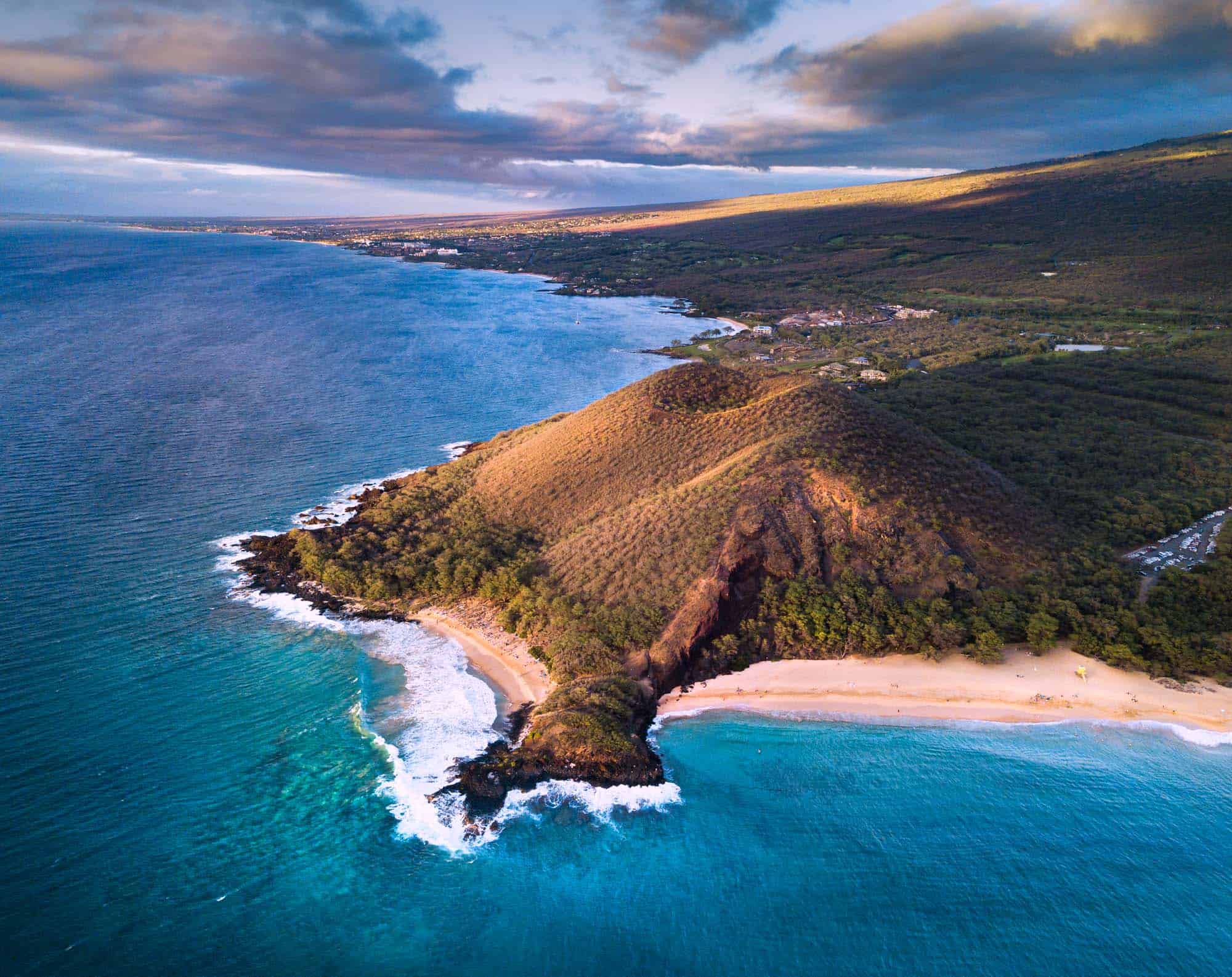 A drone photo of Makena Beach featuring Little Beach (left) and Big Beach (right).