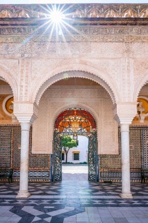 Intricate arched entranceway of Casa de Pilatos Seville taken during 3 days in Seville