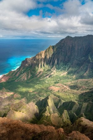 A short hike along the Kalepa Ridge Trail reveals the cliffs of the Na Pali coast.