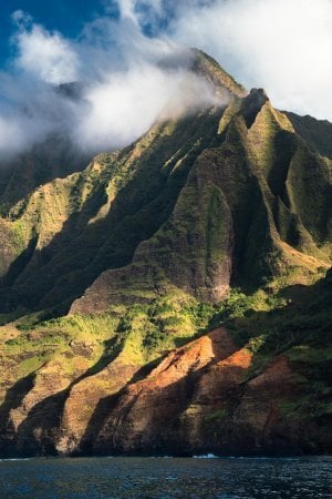 You will almost expect to run into dinosaurs while exploring the Jurassic Park-like NaPali Coast.