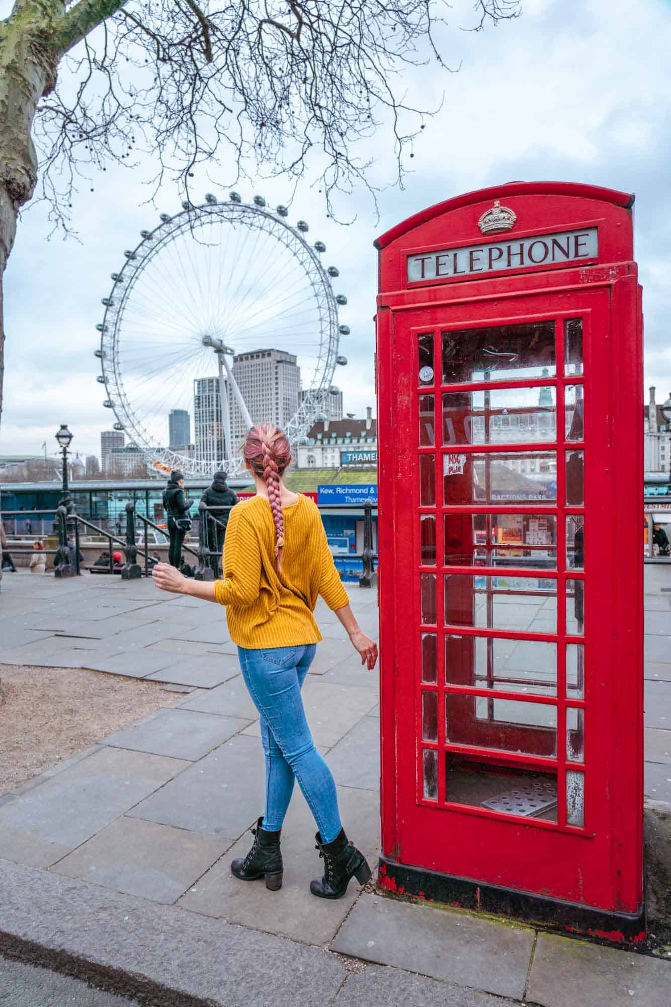 The London Eye and Red Phone Boxes on Victoria Embankment
