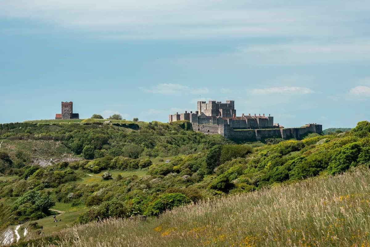 Dover Castle as seen from the White Cliffs of Dover, not to be missed on a day trip from London.