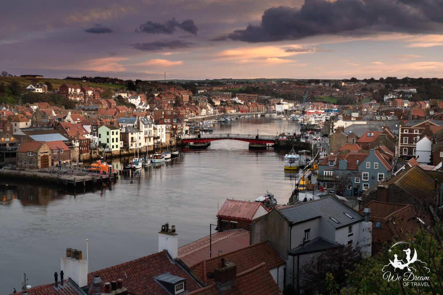 Sunset over Whitby town and harbour from East Terrace.