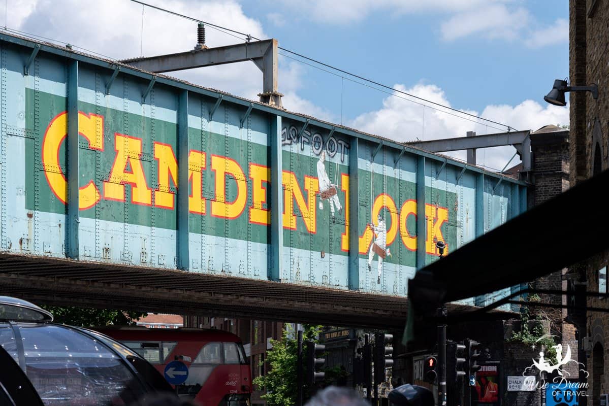 Camden Lock painted on the side of the railway bridge