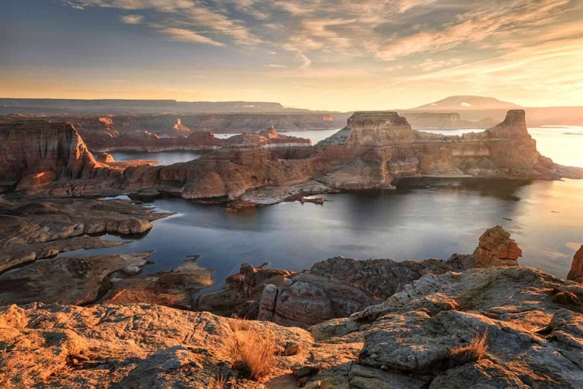 Amazing sunset photography from Alstrom Point, showing why this overlook is one of the best things to do in Page AZ for sunset.