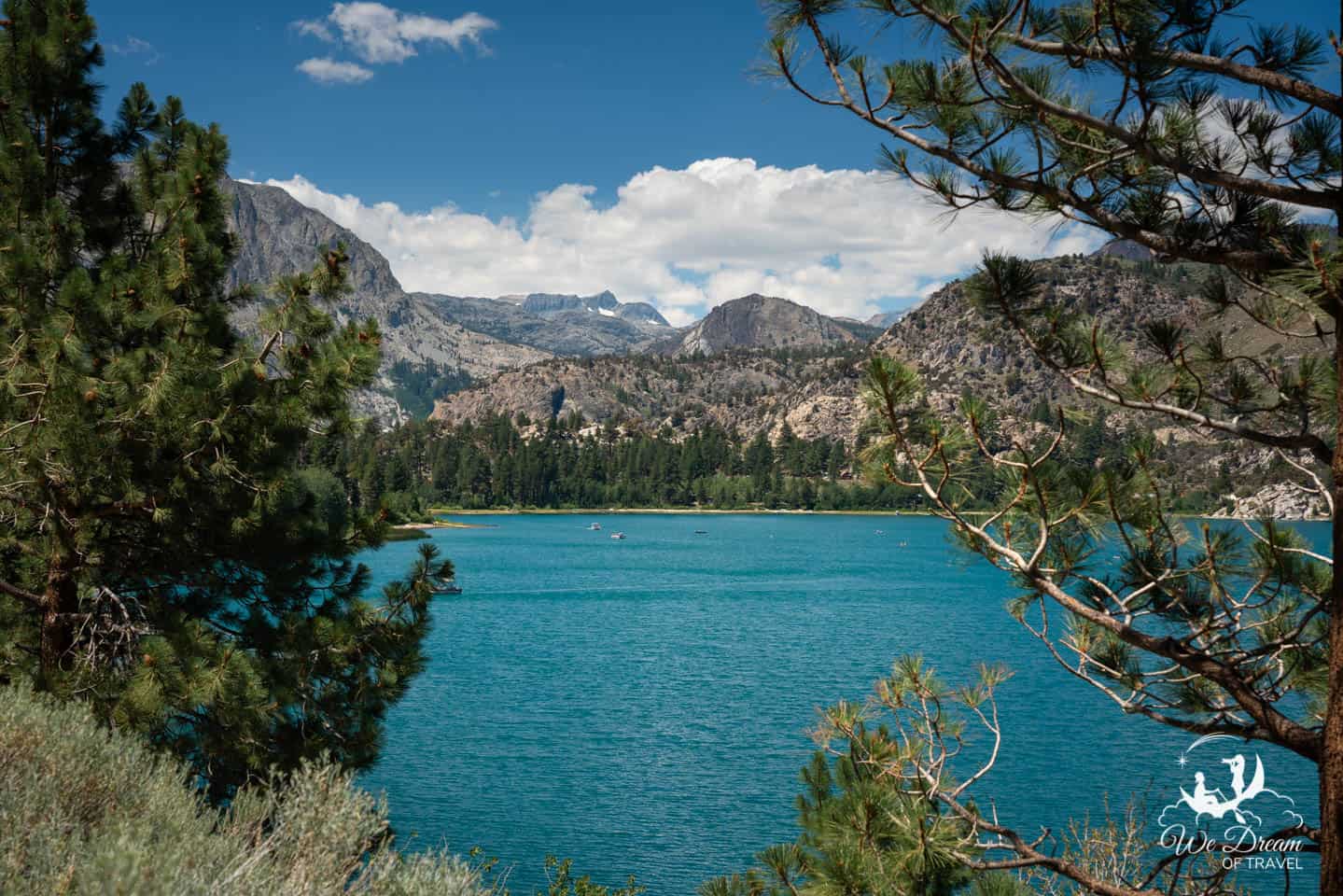 Gazing out at the inviting waters of June Lakes from a roadside viewpoint.