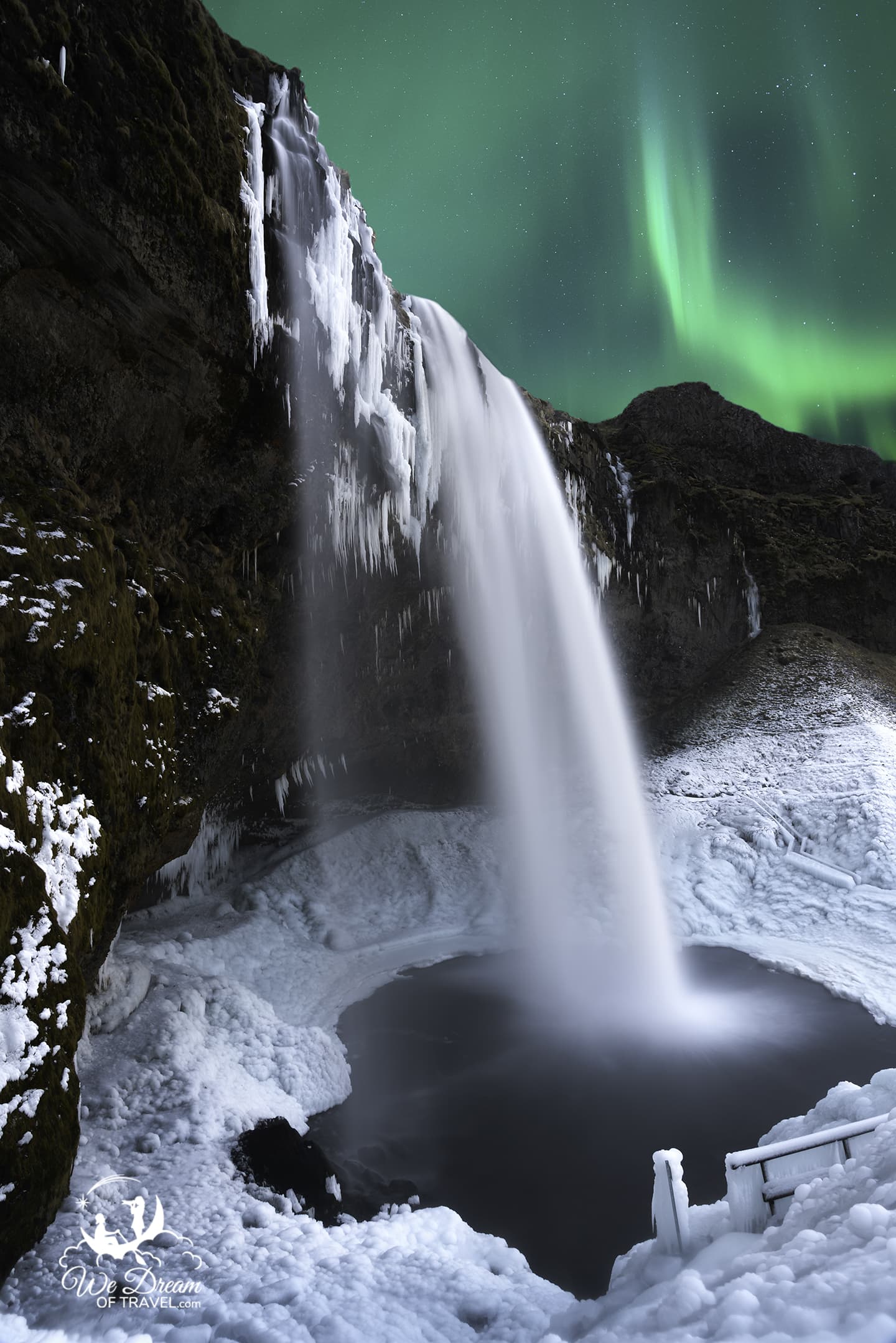 Winter photography in Iceland means many chances for Northern Lights photos as seen here at Seljalandsfoss.