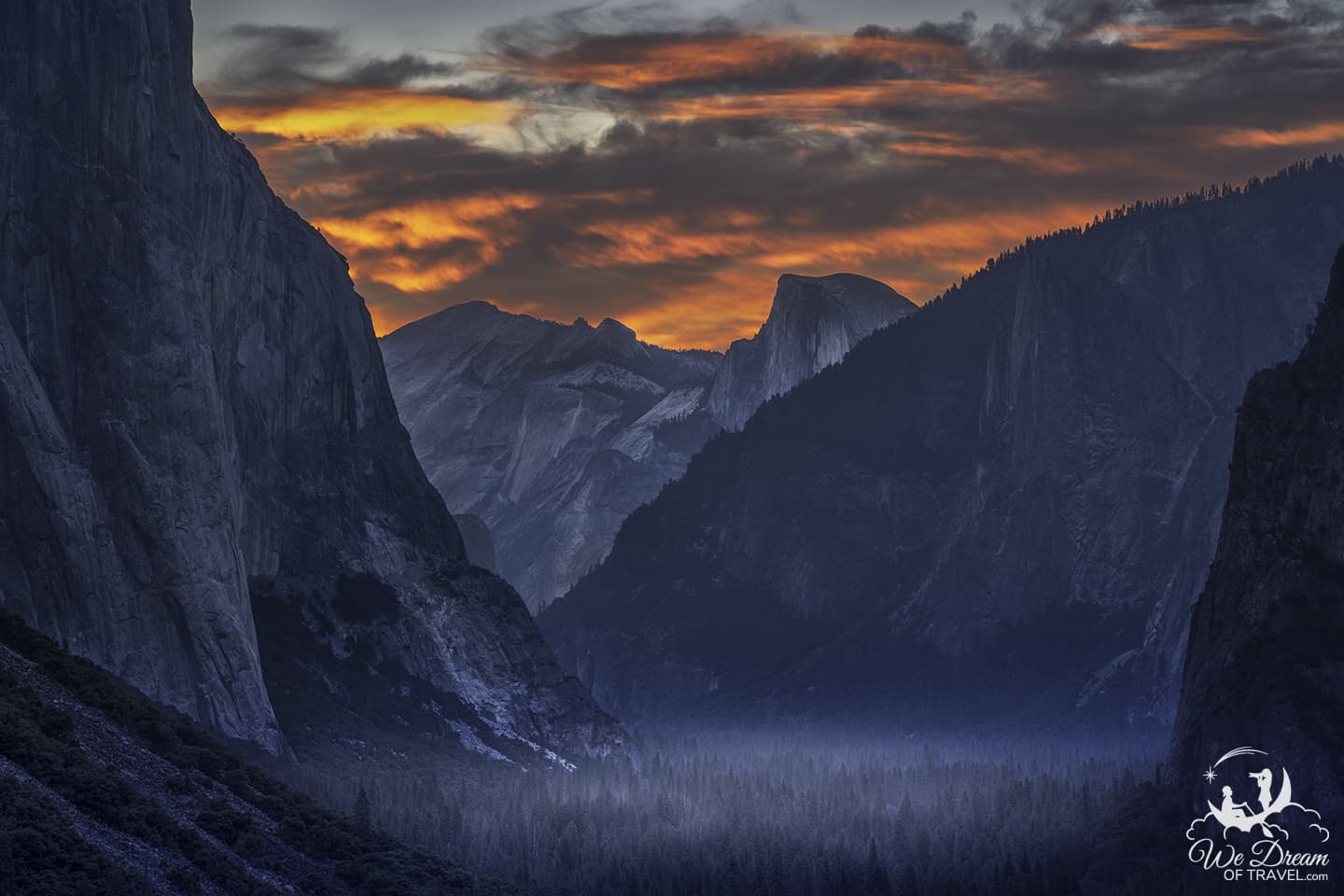 A fiery Yosemite sunrise on a moody morning from Tunnel View.