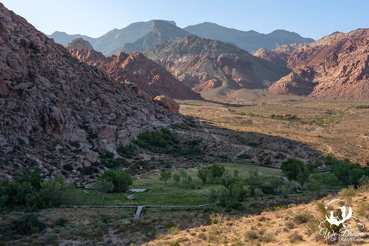 Red Spring boardwalk nestled at the base of mountains