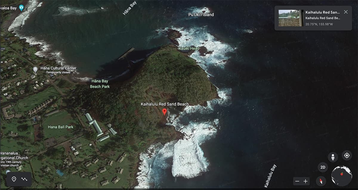 A satellite view of Kaihalulu Red Sand Beach near the town of Hana.