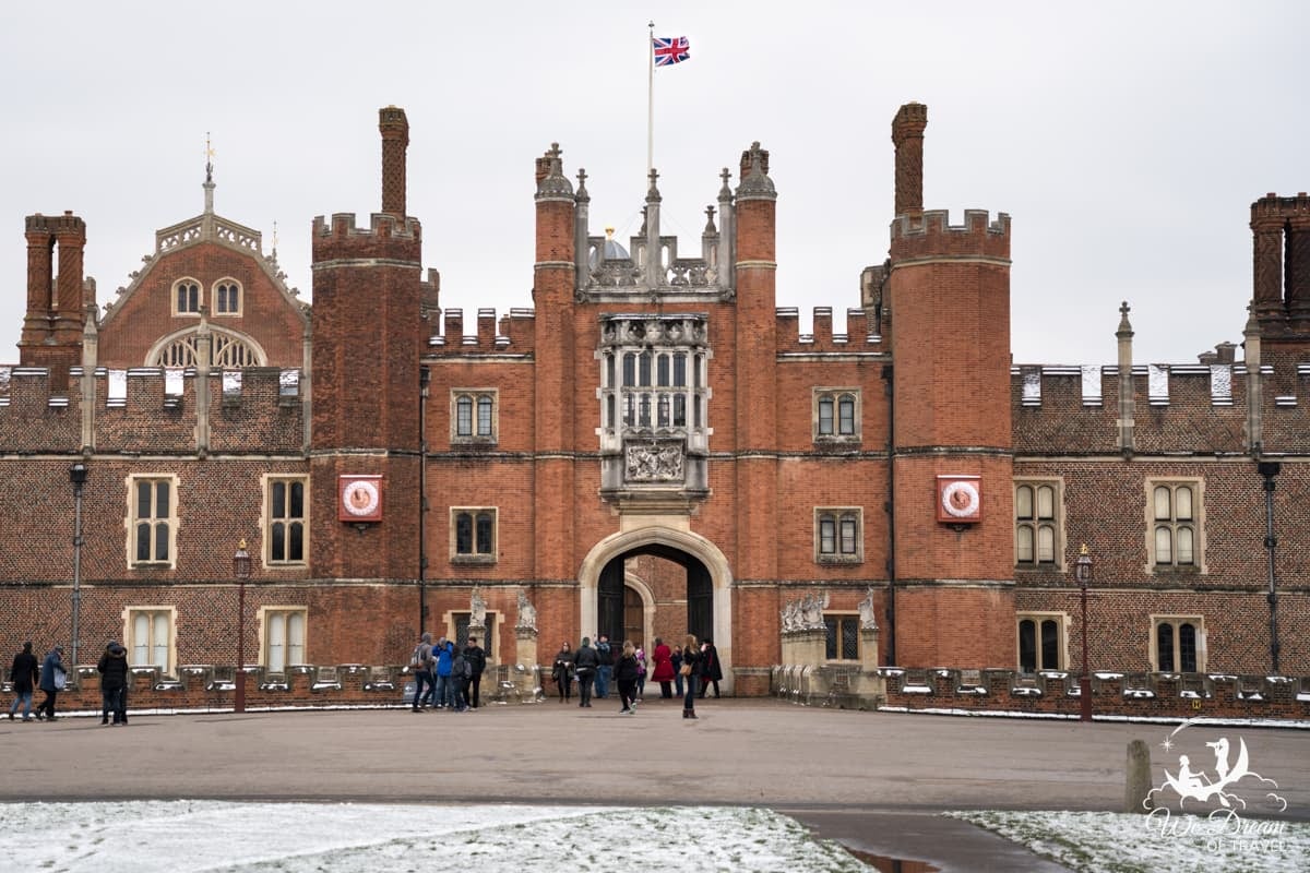 The front of Hampton Court Palace in the winter with a light snow dusting