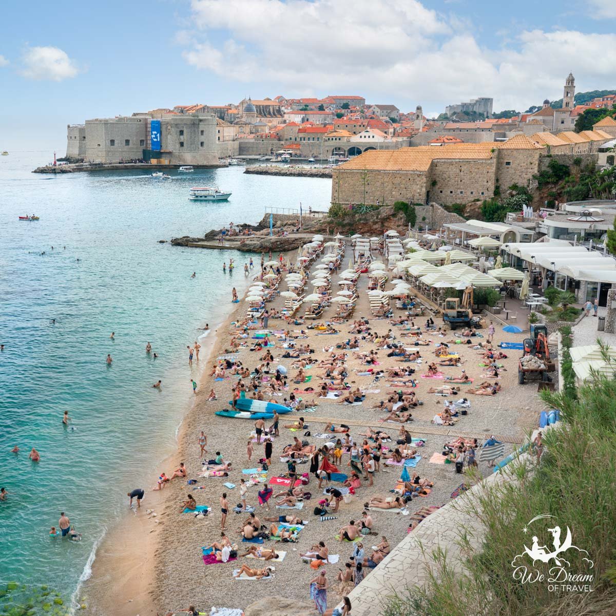 A crowded day at Banje Beach near Old Town in Dubrovnik.