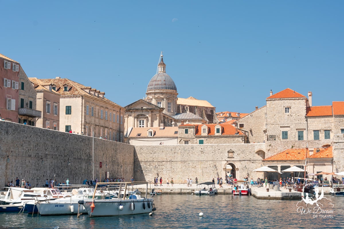 Approaching the city walls of Dubrovnik via boat.